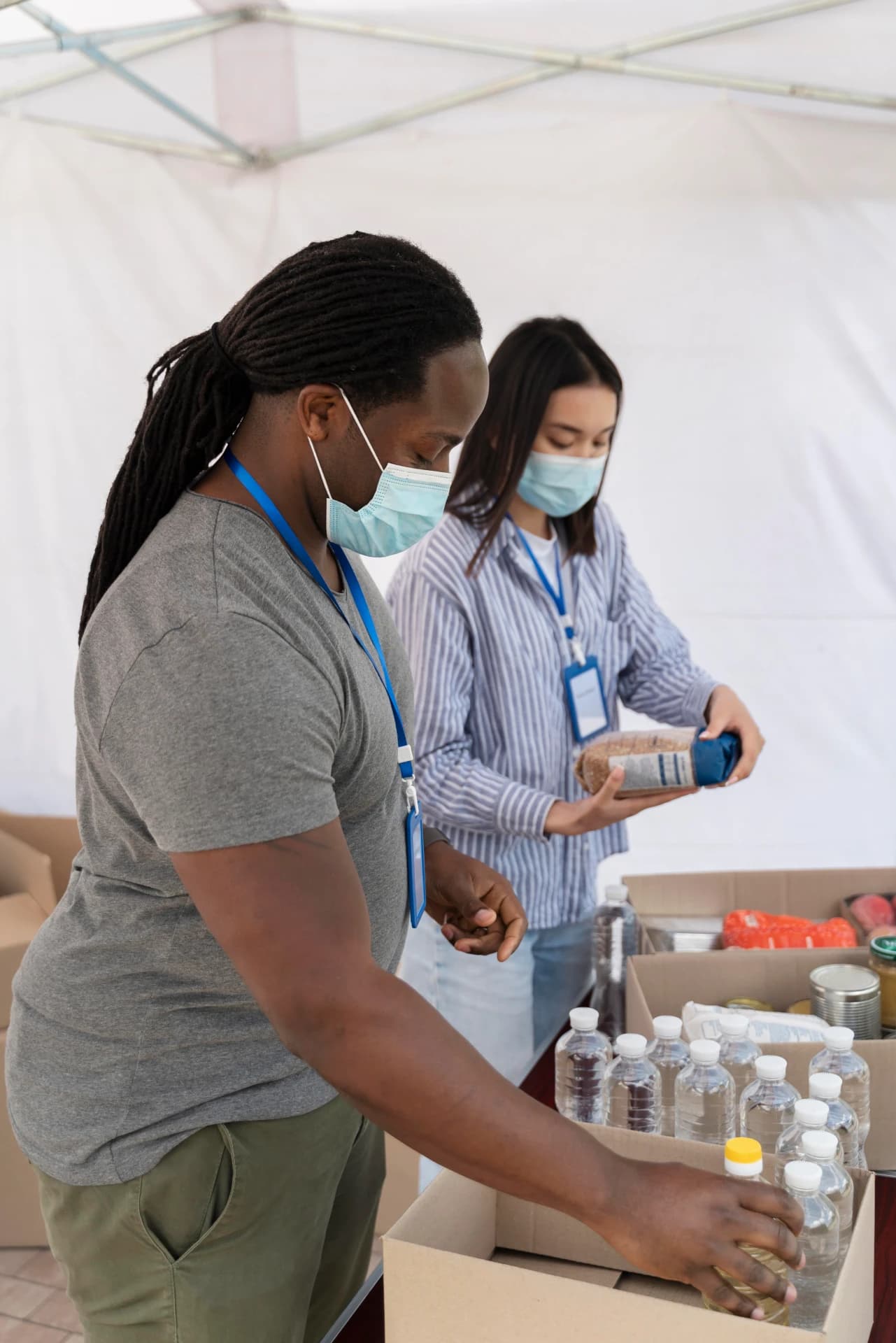 Aid being distributed at a food bank on the ground